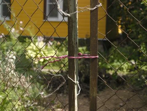 Poorly tied gate Photos