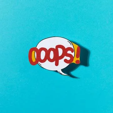 Pop art comic design oops speech bubble blue backdrop Stock Photos