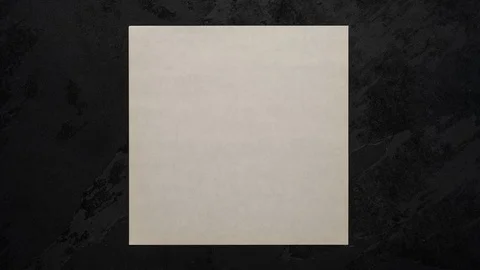 Pop Up blank paper note. Uncrumpling a square sheet of paper Stock Footage 95011445