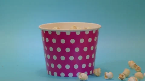 POP CORN BUCKET FALLING FROM SKY 2K Stock Footage 198228212