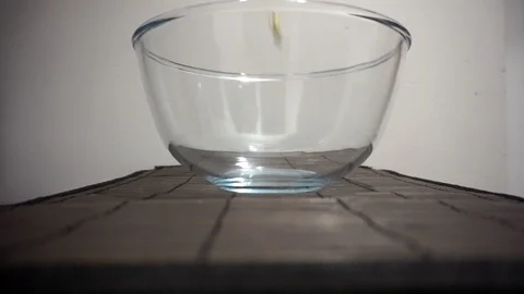 Pop corn falling down in plate in slow motion Stock Footage 86487460