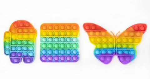 Pop it fidget. Set of 3 different silicone models. restless toy on a white Stock Photos