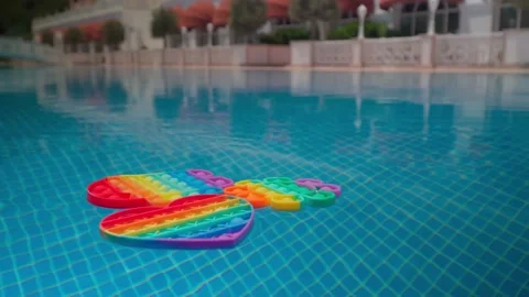 Pop it in the pool Stock Footage 155749571
