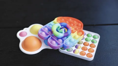 Pop it simple dimple popit snapperz anti-stress sensory toy for children Video stock 194747681