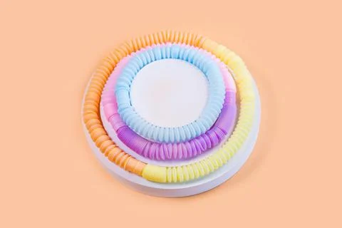Pop tubes circle composition in the form of a cake. Stock Photos