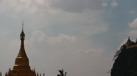 Popa hill from afar and monastery on it  in Myanmar Stock Footage 61781511