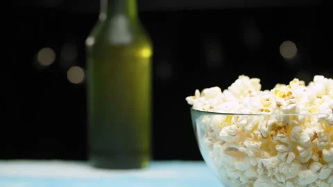 Popcorn and bottle of beer Stock Footage 140354473