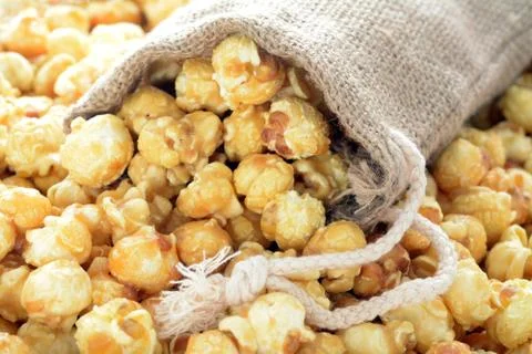 Popcorn and burlap Stock Photos