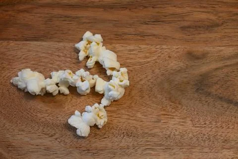 Popcorn arranged as a right-pointing arrow Stock Photos