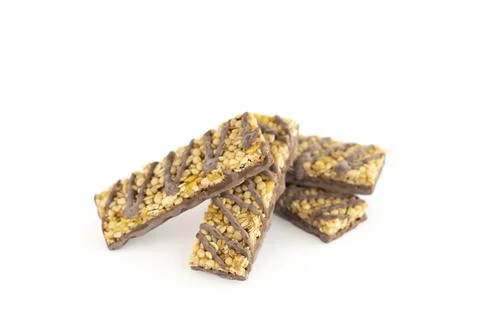 Popcorn bars with chocolate on a white background. Stock Photos