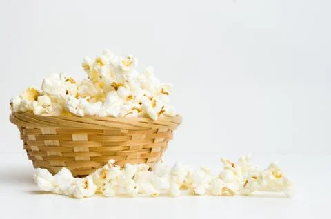Popcorn in basket Fotos de archivo