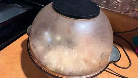Popcorn Being Made on a Countertop Stock Footage 260271980