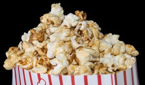 Popcorn on black background Stock Photos