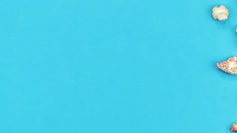 Popcorn on Blue background. Top view and close up Stock Footage 87055178