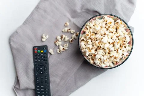 Popcorn in bowl on white background Stock Photos