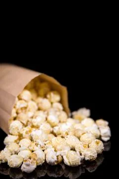 Popcorn box in front of black background, copyspace Fotos Stock