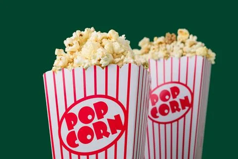Popcorn box on green Stock Photos