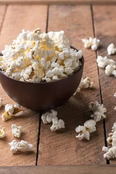 Popcorn in a brown cup Stock Photos