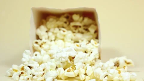 Popcorn bucket falling in slow motion Stock Footage 288453260