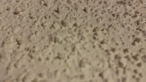 Popcorn Ceiling Up Close Shot and Pan Stock Footage 162836416