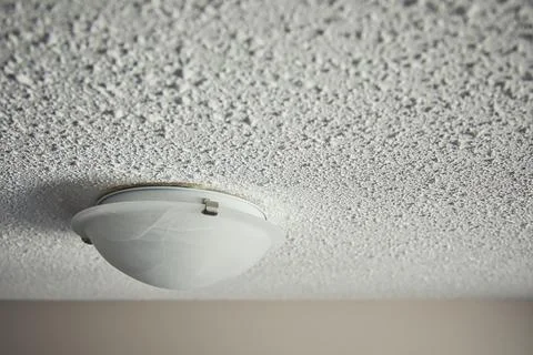 Popcorn ceiling in the house. Stock Photos