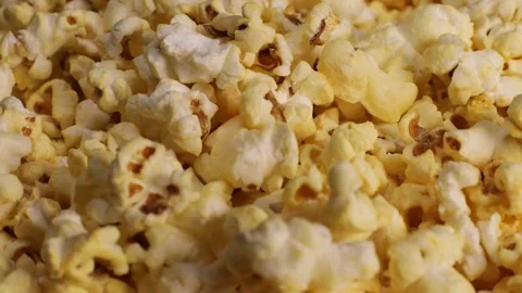 Popcorn with cheddar cheese falling down Stock Footage 227359004
