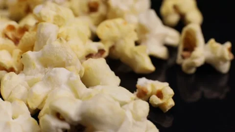 Popcorn close-up, macro rotates, snacks in the cinema Stock Footage 227359523