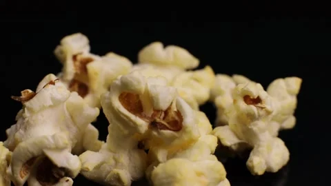 Popcorn close-up, macro rotates, snacks in the cinema Stock Footage 227359610