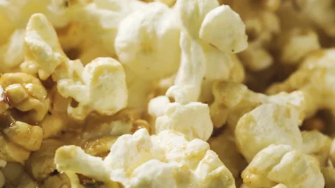 Popcorn closeup with rotating. Background with cinema popcorn celebrate.  Stock Footage 151919126