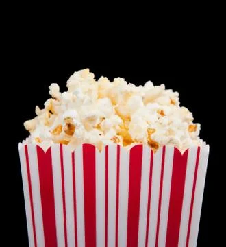 Popcorn container on a black background Stock Photos