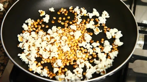 Popcorn cooking in a pan Stock Footage 46937206