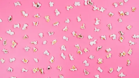 Popcorn dances on a pink background. 4k. Stop Motion. Stock-Footage 87166422