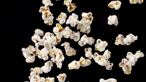Popcorn explodes closeup in super slow motion 1000fps Stock Footage 257056085