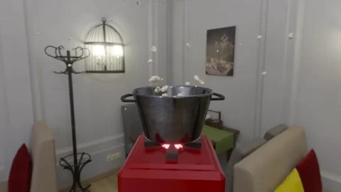 Popcorn Exploding and Spilling from a Pot on a Mini Stove Indoors Stockbeeldmateriaal 347230253