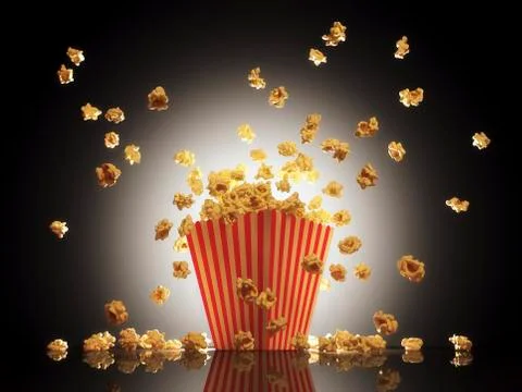 Popcorn exploding from bucket Stock Photos