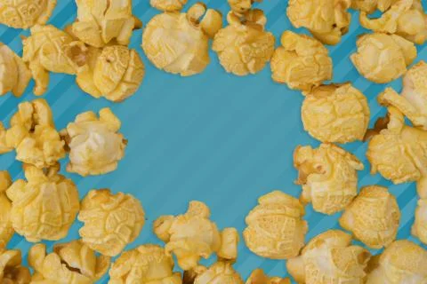 Popcorn flat lay composition on color background. cinema snack concept Modern Stock Photos
