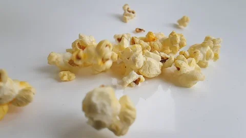 Popcorn flies on a white background Stock-Footage 87876995