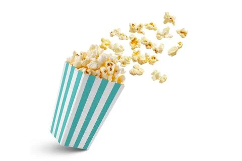 Popcorn flying out of turquoise white striped paper box, isolated on white .. Stock Photos