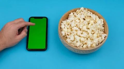 Popcorn green screen phone Stock Footage 260163199
