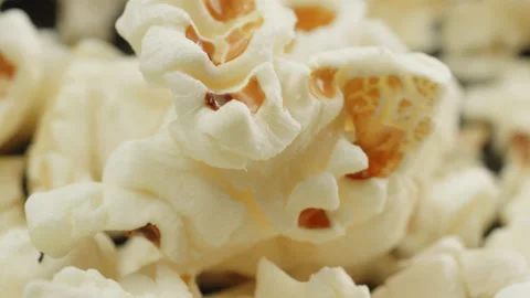 Popcorn kernels macro close up presentation slowly rotating stock footage Stock Footage 344682808