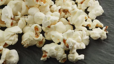 Popcorn kernels macro close up presentation slowly rotating stock footage Stock Footage 344684566