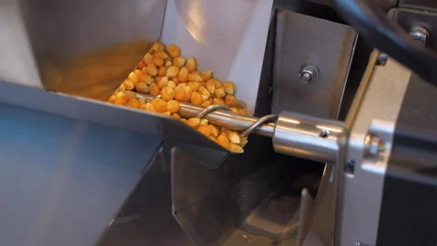 A popcorn machine produces large quantit... | Stock Video | Pond5