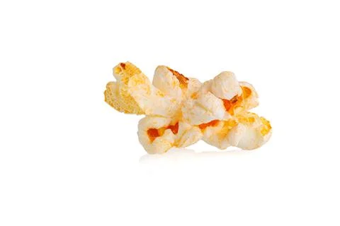 Popcorn macro on a white background Stock Photos