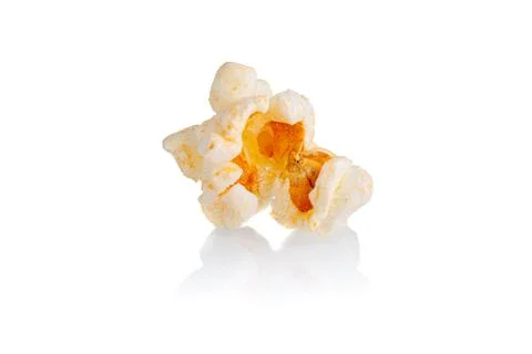 Popcorn macro on a white background Stock Photos