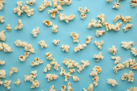 Popcorn pattern on blue background. Top view Fotos de archivo