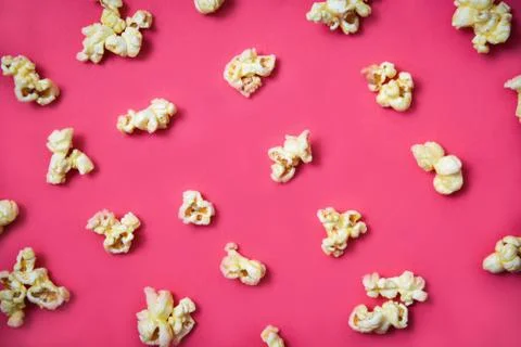 Popcorn pattern on red background on top view / Sweet butter popcorn Stock Photos