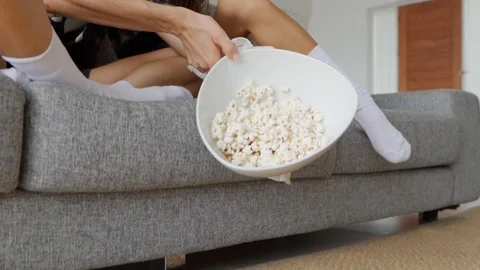 Popcorn plate falling on a floor Stock Footage 129608629