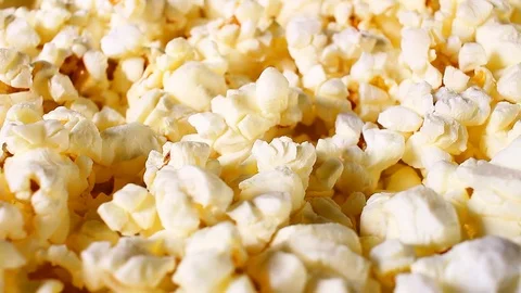 Popcorn popcorns rotating closeup texture pattern background Stock Footage 97247431