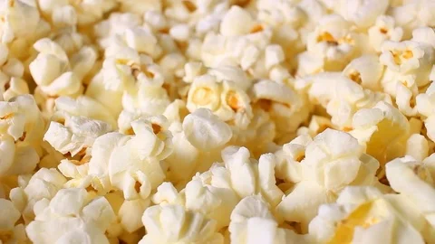 Popcorn popcorns rotating closeup texture pattern background Stock Footage 97247533