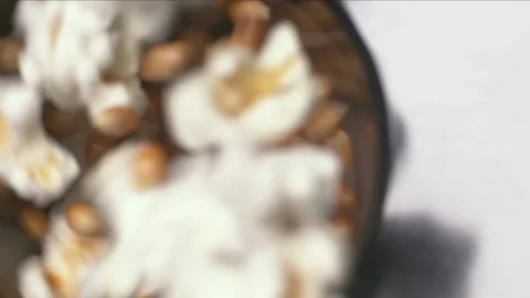 Popcorn popping inside the popcorn machine Stock Footage 171648020